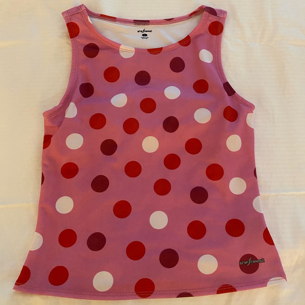 SheBeest excercise or workout shirt with integrated bra.